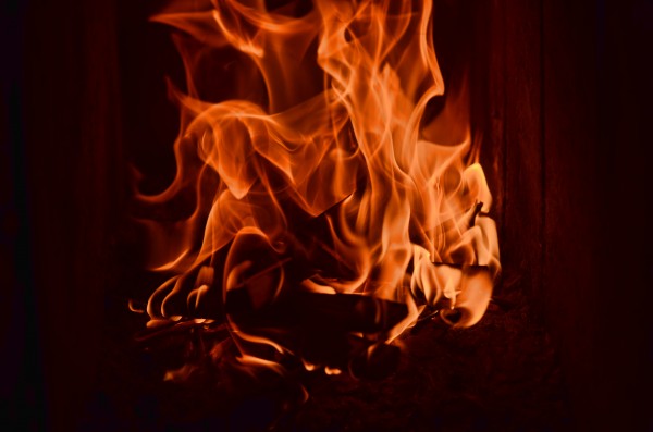 Fierce fire flames in the fireplace by Codrina Miculit